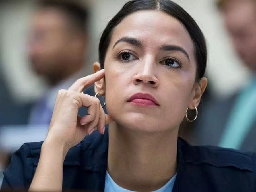 AOC listening intently