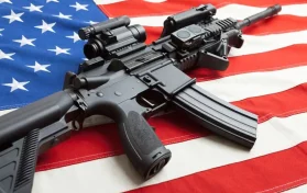 gun on American flag