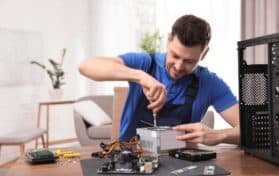 man building a computer