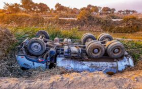 Alttext Wrecked Truck Upside Down On Roadside