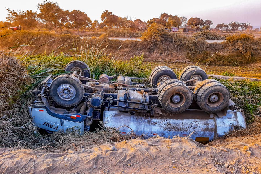 Alttext Wrecked Truck Upside Down On Roadside